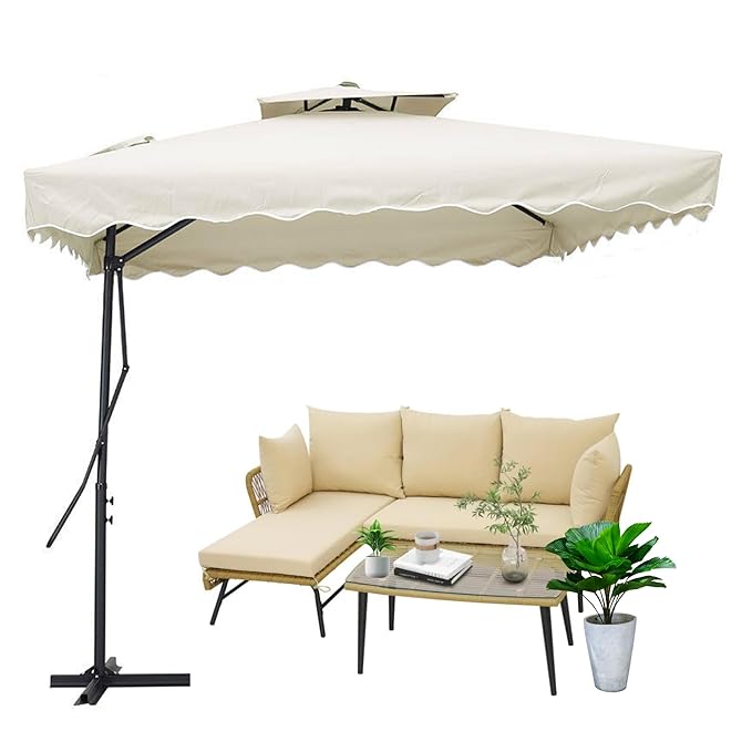 Beige outdoor sofa with a matching umbrella and small table on a white background