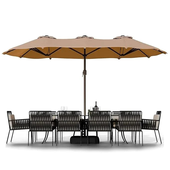 Outdoor furniture set with a large beige umbrella on a white background